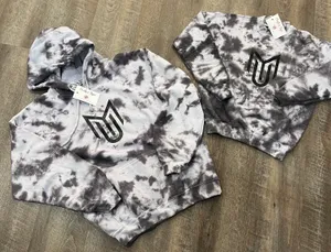 Black and white hoodie with black MU