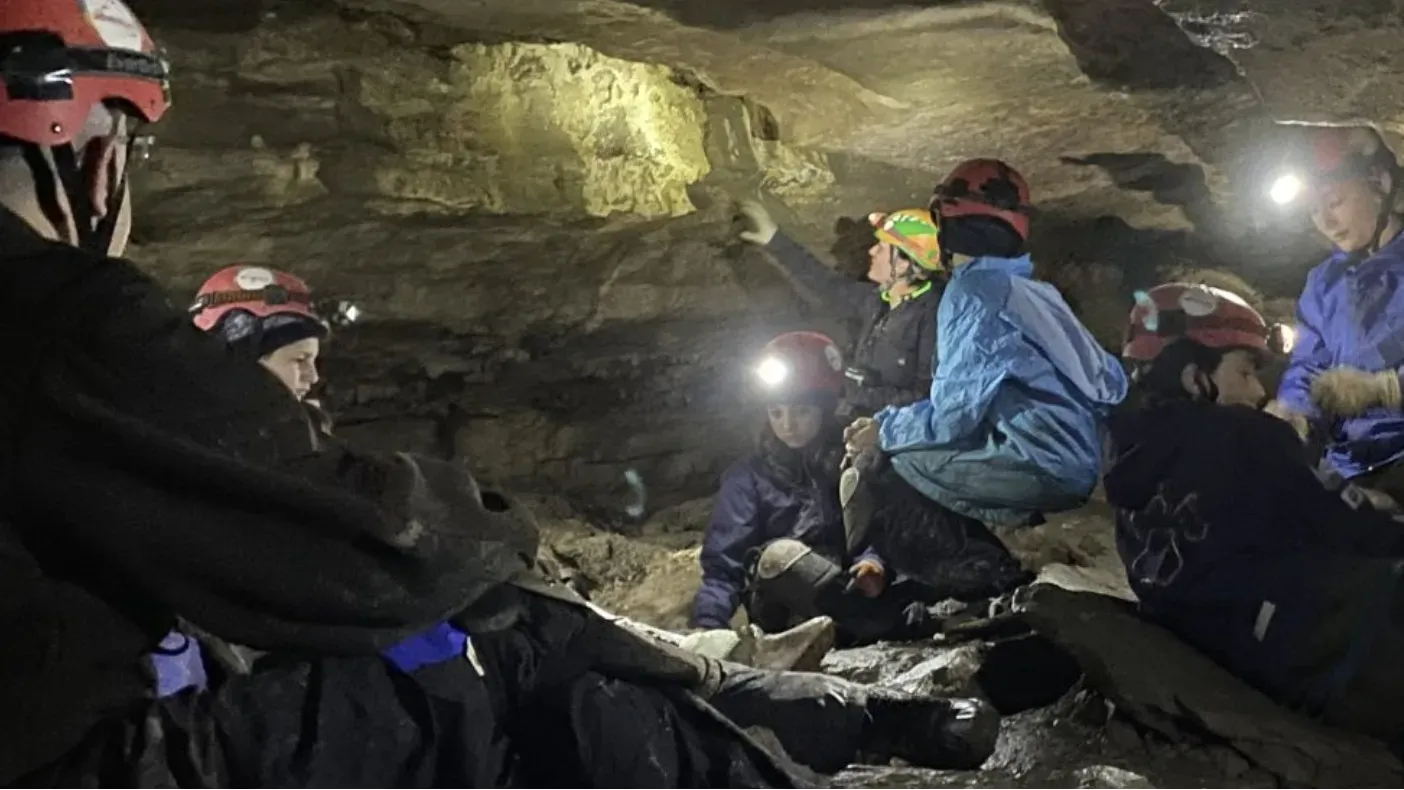 Caving - February '26 banner